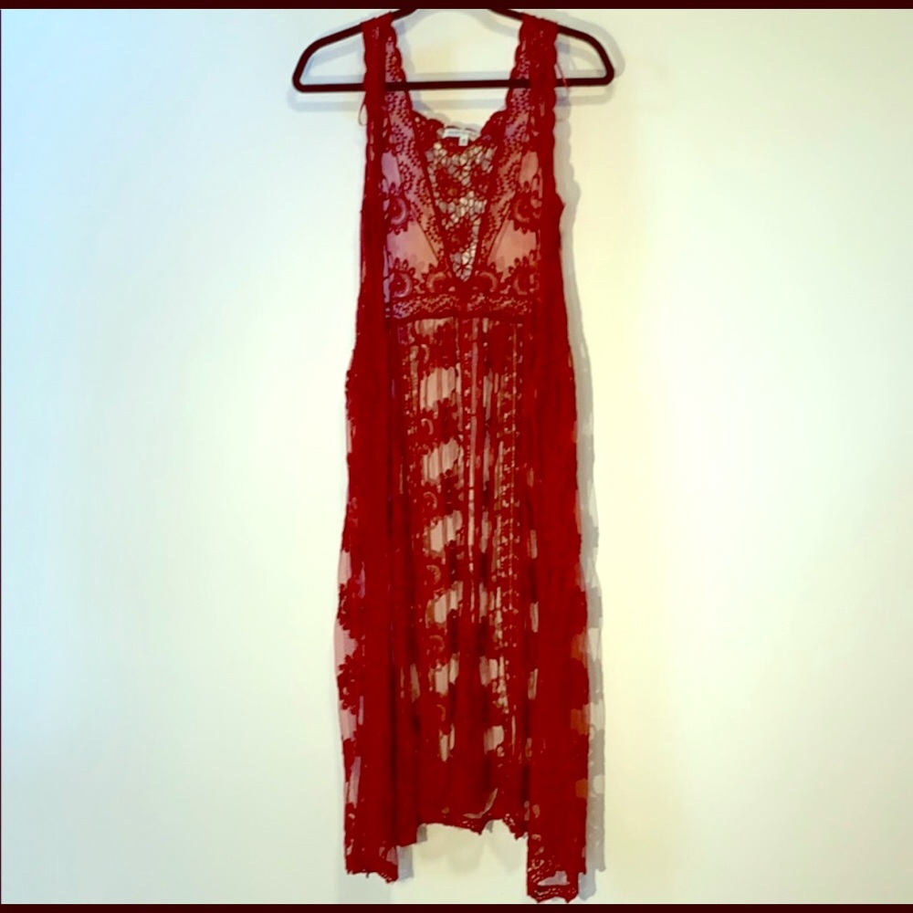 Rust/burgundy colored vest duster.